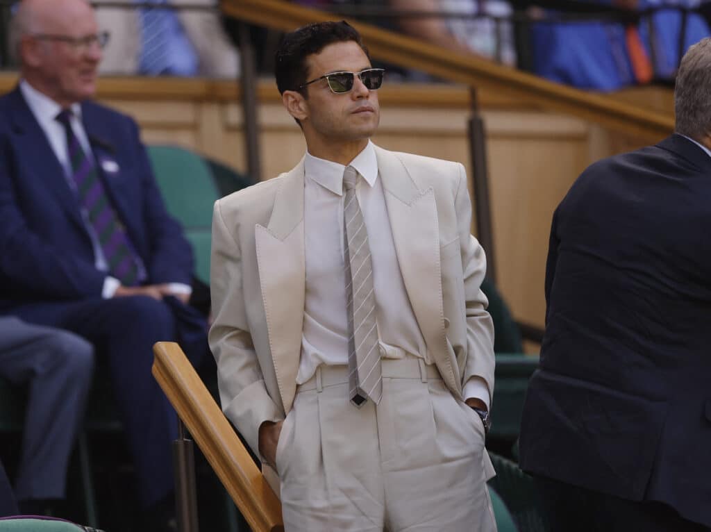 Tennis - Wimbledon - All England Lawn Tennis and Croquet Club, London, Britain - July 11, 2025 Actor Rami Malek in the royal box in centre court ahead of the semi final match between Spain's Carlos Alcaraz and Taylor Fritz of the U.S. REUTERS/Andrew Couldridge